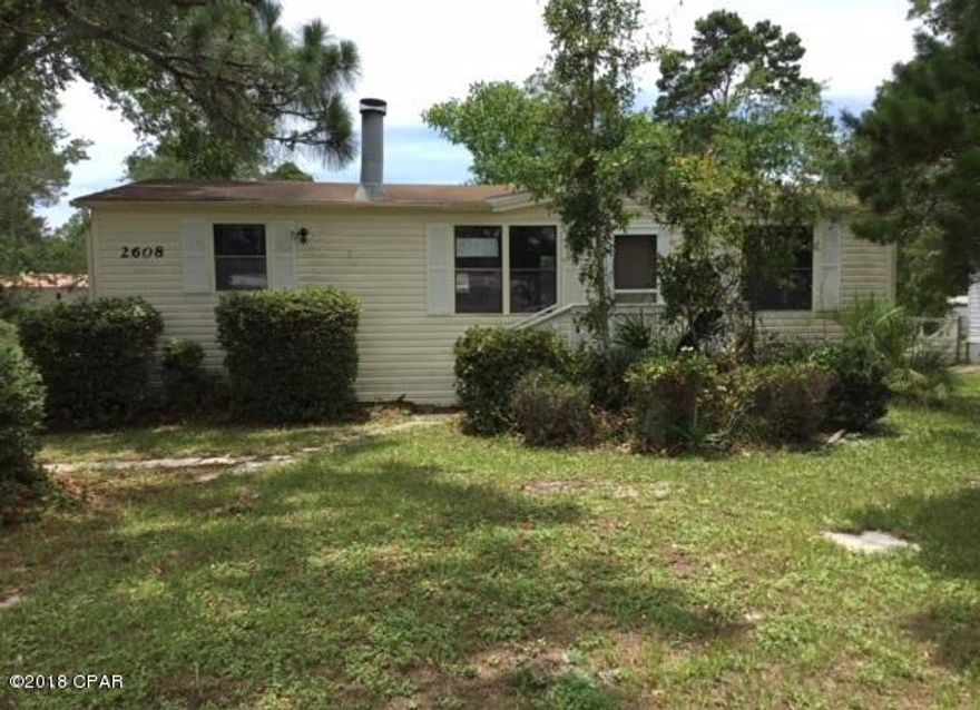 3BR/2B mobile home located in a residential community near the beach. Living room has fireplace. Split bedroom floor plan. Partial fenced back yard. Being Sold ''AS IS''.