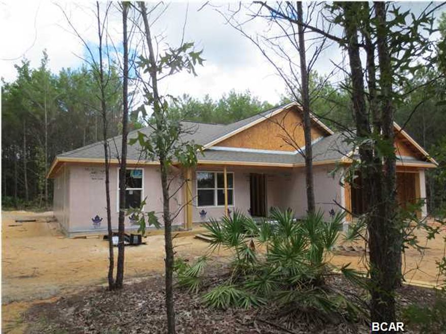 BRAND NEW CONSTRUCTION; 3 bedrooms 2 bath all brick home located on an acre lot. Open floor plan with Cathedral ceilings in family room, and dining room. Kitchen has a breakfast bar, nice appliance package and open to Family room. Split bedroom plan with an office that has a built in desk. Lots of closet and storage space, nice laundry room and a two car garage. This home is built with 2 X 6 exterior stud walls so you won't be running from any hurricanes here. The walls have R19 and the ceilings have R32 insulation in them. Low E double paned windows and underground utilities all located within 20 minutes of the beach or downtown. At this point you still have time to choose flooring, cabinets, appliances and Lighting so hurry up and call today.