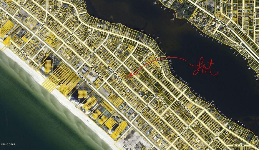 Lot conveniently located just blocks from sugar white beaches.