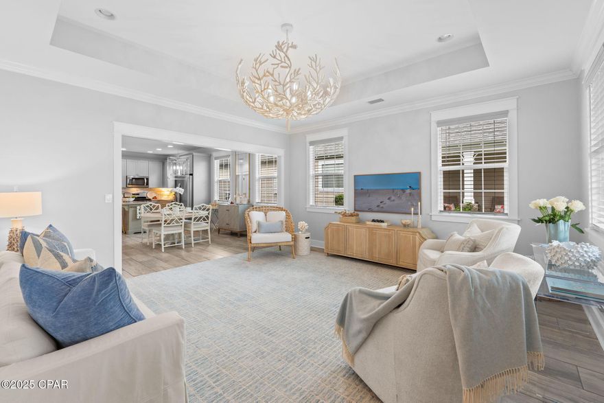 Furnished or Unfurnished price options for this home at 109 Turtle Cove in Panama City Beach, FL, where coastal charm meets classic style. This inviting beach retreat is a true gem, ready for you to move in with just your personal belongings. Custom built 1756 square feet designed home features three spacious bedrooms & two bathrooms. The open-concept layout features crown molding and 9 foot ceilings with premium upgrades including high end lighting fixtures, wood tile flooring, & abundant storage solutions.
The kitchen is fully equipped to meet the needs of any home chef. It boasts a gas stove & cooktop, a microwave, a large refrigerator all centered around a stainless steel island. The expansive pantry & ample cabinetry make it a hostess' dream for storing entertaining essentials. Enjoy leisurely meals in your cozy dining area or step out onto your private patio to savor breathtaking sunsets.
Beyond the home's stunning interiors, the vibrant community offers an array of amenities. Dive into relaxation with a large pool and hot tub, engage in a game of tennis or pickleball, or maintain your fitness routine at the fitness center. For those with a love for water adventures, a dock provides access to the serene Lake Powell and the majestic Gulf of America. With the convenience of both an attached garage and carport, alongside a spacious laundry room, this home is perfectly set up to be your primary residence or an idyllic second home.
Located just 1.1 miles by golf cart or bike from pristine white sandy beaches, you're also a mere 3 miles from the eastern end of the iconic 30A Highway and 6.5 miles from the lively Pier Park shopping and dining district. The location is truly unparalleled, offering the perfect blend of convenience and community spirit, with welcoming neighbors that make Turtle Cove at Lake Powell an exceptional place to call home. Discover the delightful lifestyle awaiting you at the entrance to Wild Heron and Sharkstooth Golf Club.