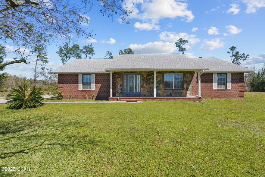 'CURRENTLY UNDER CONTRACT, SELLER WILL CONSIDER BACKUP OFFERS.  Bring your horses...Endless possibilities! ZONED MIXED USE with several income-producing outbuildings  All the charm of country living with the  convenience of being minutes to town and the water.Big Mama's restaurant opening soon and Dollar General right down the street plus new entertainment complex being built in the near future! This unique property offers 2.4 acres with a pond and 24 foot diameter above-ground pool to spread out and relax! Solid brick with  3BR/2BA split -plan PLUS a mother-in-law suite with separate entrance and full bath and laundry room. Home has been updated: roof, LVP flooring, new paint and ceilings.  Spacious kitchen with walk-in pantry and large nook with more storage PLUS there are 6 outbuildings, several of which are heated and cooled waiting for a new owner to add their personal touch. Full-length  front and back porches! This home was built with storage in mind.  Master and 2nd bedroom both have walk-in closets.  Pet door to fenced back yard and decked attic for additional storage.