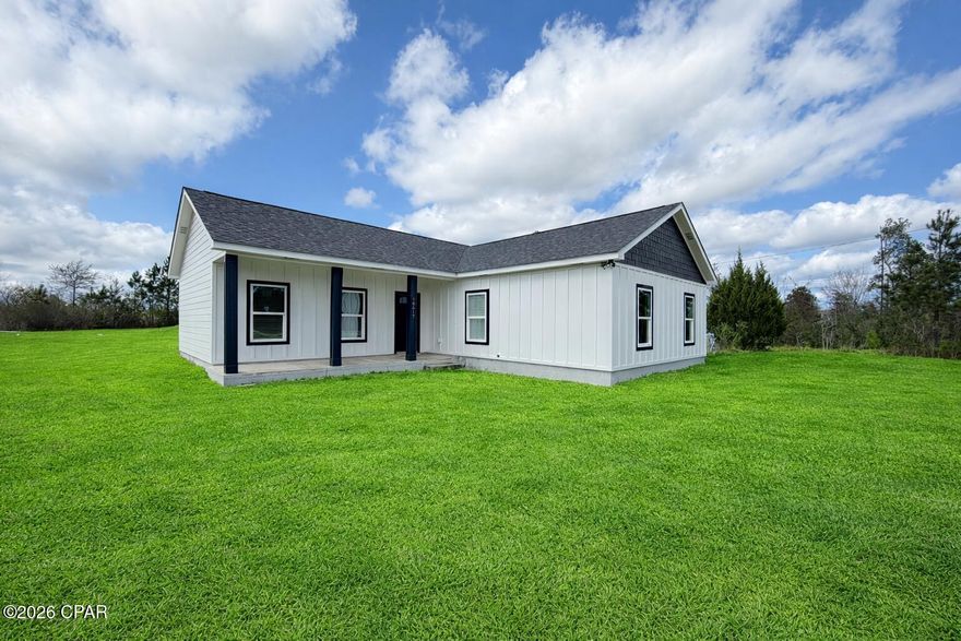 Welcome to this beautiful new construction ranch-style home situated on a fully cleared 1-acre lot in a peaceful country setting. This spacious home offers 4 bedrooms, 2 bathrooms, and an open-concept floor plan designed for comfortable modern living. The interior features 9 foot ceilings, luxury vinyl plank flooring throughout, recessed lighting, and stylish modern fixtures.

The kitchen and bathrooms are highlighted by attractive tile backsplashes, adding both style and functionality to the space. The open living area provides plenty of natural light and a layout that is ideal for everyday living and entertaining.

The exterior features durable Hardie board siding, offering long-lasting curb appeal and low maintenance. The cleared 1-acre lot provides ample space for vehicles, equipment, recreational use, or small livestock.

Conveniently located just minutes from Panama City and Panama City Beach, this home offers the privacy of country living while remaining close to shopping, dining, and area amenities. The property is also approximately a 5-minute drive to the new Publix shopping center featuring Starbucks, Marco's Pizza, McDonald's, UPS, and a Mexican restaurant coming soon, adding even more convenience to this great location.

Schedule your showing today to see all this property has to offer.