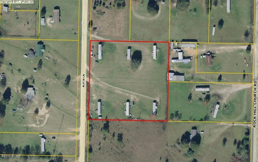 Great investment opportunity! 3.6 acres just outside the city limits features 6 mobile homes, 6 septic tanks and a 500 gallon well. Owner states potential rental income is $2,540/month when at full occupancy. Currently 5 of the 6 mobile homes are occupied.