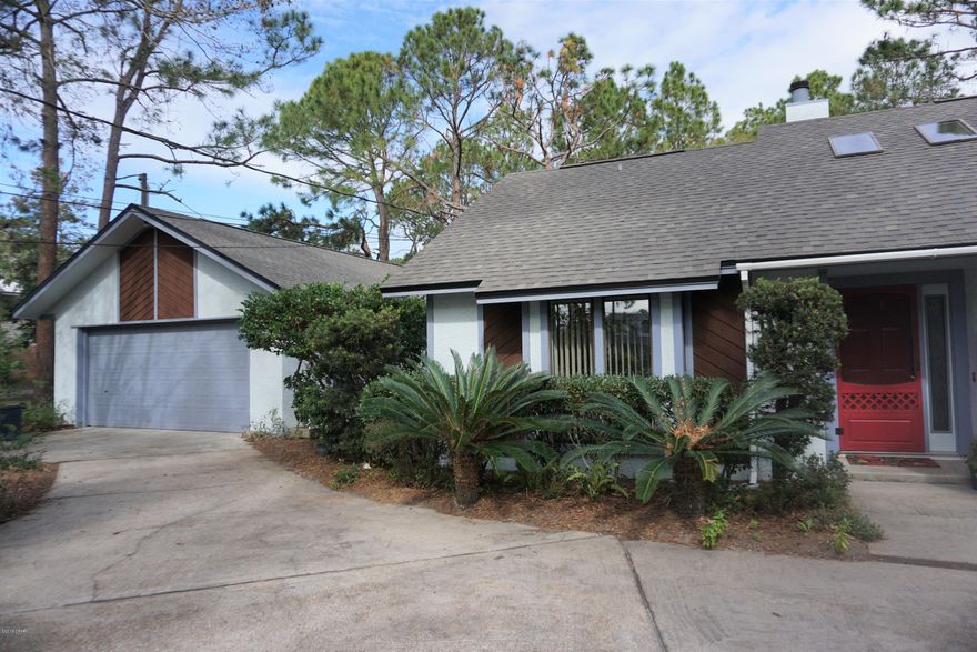 Lovely, custom built, 5 bedroom, 2½ bath home with 2,535 sq.ft. situated on an acre lot just ½ mile west of the Navy Base. Spotless home features a large kitchen with updated appliances, granite counter tops and porcelain tile flooring.  A beautiful stone fireplace is the focal point of the great room which also features skylights for natural lighting, wood flooring and screened porch (360 sq. ft.). Bedroom floor plan is a double split. New roof on house and detached, drive-through garage/shop (960 sq. ft. – 24 x 40) with over 400 sq. ft. of decked attic storage. A craftman's dream! Access lot from two streets. Granite countertop vanities, marble tile in tub/shower with solar tubes in the bathrooms.  Family room with 2 adjoining bedrooms.  Low utility costs. Pride in ownership is apparent! The lot is a park-like setting with a variety of trees and plants (including beautiful, mature azaleas and fruit trees) and is low maintenance.  No HOA Fees.  No flood insurance required by lender (Zone X).  Schedule a showing to see this wonderful home with a unique country setting near the base and the beach. All measurements and dimensions are approximate and should be verified by the buyer.