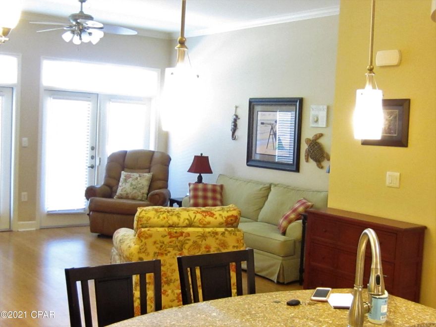 This is a much sought after GROUND FLOOR, beautifully furnished unit located at the resort like condo complex of Island Reserve! Located just a few steps to the 1 acre lagoon style POOL with waterfall, hot tub and splash pad! Tons of amenities, also include a state-of-the-art full gym, 1/2 court indoor basketball court, and a club room with pool table. This condo boasts lots of storage closets and cabinets, 10 foot ceilings, granite counter tops, stainless steel appliances and lots of natural light. Two master suites, deep garden tub, huge closets, spacious showers, and two and half baths complete this beautiful,vibrant and fun space. What a great place to live full-time or call your Vacation home!  Available May 1.