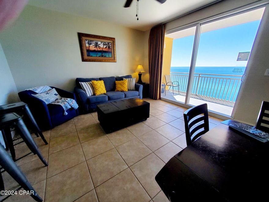 CURRENTLY UNDER CONTRACT, SELLER WILL CONSIDER BACKUP OFFERS...  GULF FRONT UNIT with an amazing view at SPLASH beach resort. *** CLEAN and RENTAL READY *** with NEW HVAC; NEW WATER HEATER (replaced in January 2024); Matching furniture and decor; Newer Stainless Steel Whirlpool appliances; Breakfast Bar; updated ceiling fans; can lighting throughout; 18 inch Tile and Luxury Vinyl Plank flooring; large balcony and a large TV with Roku.  King bed in the master bedroom, pocket door to the master bath and a large soaker tub to relax. Hallway Bunks and a hide-a-bed couch for extra sleeping space; unit sleeps six easily. The SPLASH Resort is known for its wonderful amenities for families! Something for everyone-- including a large fitness center, outdoor spa, water park, lazy river beachfront pool, Toddler Play area, arcade, tiki bar, Rip Tide Bar & Grill and an easy access sky walk to covered parking. This location is across the street from ''Alvin's Island'' beach shop, and only a few blocks away from the locals' favorite, Mike's Diner.  Pier Park Outdoor Shopping Mall is only 2 miles away, Carillon Beach and the 30A corridor are only a few minutes away to the West. This is a special unit in a great gulf-front location at an incredible complex. Come see.