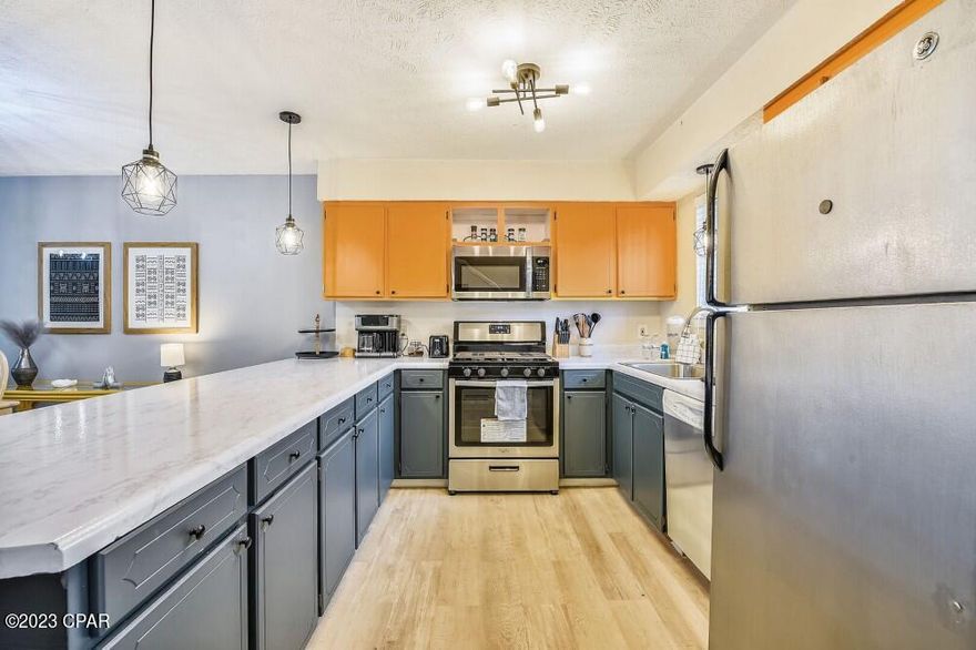 Fully updated glass back unit. All new flooring, walk-in showers, furniture, hardwood stairs, fresh paint etc. It is located right next to one of the 11 pools. 2 assigned parking spaces in front of the unit. A short 5 min walk to the beach. HOA includes: 11 pools(5 heated), shuffleboards, beach house/café, mini golf, exercise room, tennis courts, playground, WIFI, cable, pest control, termite bond, trash, ground keeping, property patrol, gated community etc.