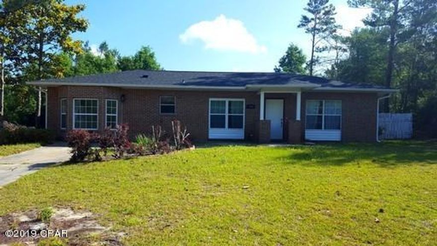 All brick home located in Sunny Hills community on a large lot with 20x20 storage building