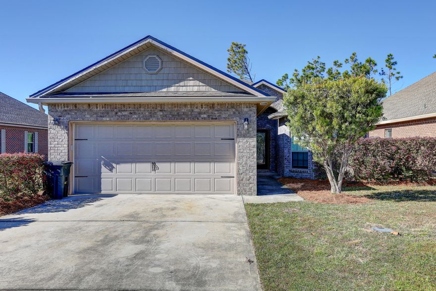 Wonderful 4 bedroom 2 bath home, featuring raised ceilings, tray ceiling, hardwood flooring, 16'' tile in the kitchen and bathrooms and so much more.  This offers a very open floor plan with a spacious kitchen complete with granite countertops, upgraded stainless appliances, wood cabinets, a breakfast bar and plenty of counter space for all of your food preperations.  Large master suite beautiful on-suite bathroom and oversized walk in closet, all the additional bedroom are very roomy.  You will love the covered porch for your morning coffee and grilling out with family.  You will not be disappointed in the quality of this lovely home.  Call for your private showing today.  All ages, sizes are approximate measure if important.