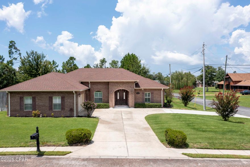 Under Contract Taking Backups -  Beautiful Custom Home in College Oaks.  3-bedroom, 2.5-bath home with an office, in the desirable College Oaks subdivision of Lynn Haven. Built with ICF (Insulated Concrete Form) construction, this property is designed for strength, energy efficiency, and peace of mind. With hurricane-rated impact windows and shutters, a Generac whole house generator, and premium energy-saving systems, you'll enjoy comfort and security year-round. Step inside through elegant double mahogany doors and discover thoughtfully designed, freshly painted, living space featuring 9'4'' ceilings, plantation shutters, crown molding, and a coffered ceiling in the great room. The chef's kitchen offers cherry cabinetry, Cambria Quartz countertops, a black granite sink, roll-out drawers, and high-end appliances including a gas cooktop, wall oven, and wine fridge. New HVCA with 10 yr warranty.  The master suite is a true retreat with a tray ceiling, sitting area, walk-in closet, and a spa-like bath with tiled walk-in shower and cultured marble finishes. Two additional bedrooms provide generous space for family or guests.

Enjoy year-round views of the wildlife-filled preserve from the heated and cooled sunroom, or entertain outdoors with lush sod, deep-well irrigation, and a fenced backyard. The oversized 2.5-car garage provides plenty of storage.

Located in a safe, walkable neighborhood and a short drive to Tyndall AFB, this home combines luxury, durability, and convenience.