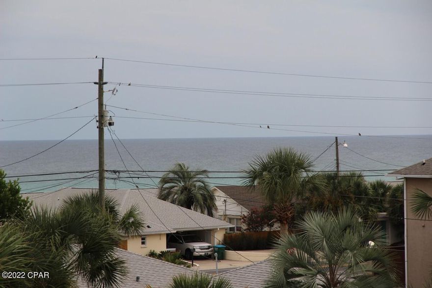 CURRENTLY UNDER CONTRACT, SELLER ACCEPTING BACKUP OFFERS.....  ONLY 2 HOMES OFF FRONT BEACH ROAD WITH GULF VIEWS.   Newer construction 4bd/3bth, built in 2005.  ROOM ON SIDE TO INSTALL A PRIVATE POOL.  FULLY FURNISHED RENTAL READY. Newer TV's in all the bedrooms (except downstairs bd).  Brick paver parking area and walk-way. Hardwood floors, TV mounted on the wall, Granite in kitchen, Large living room, crown molding, big dining area, 42'' cabinetry in kitchen, Stainless Steel appliances, TWO MASTER SUITES, ONE ON 1ST FLOOR, ONE ON 2ND FLOOR. Washer/dryer on main floor, Separated tub and shower in Master Bath, Tons of windows on the 3rd floor, Gulf views from 3rd floor. Metal roof. NO ELEVATORS, NO HOA. Drive right up to your home.  AC replaced in 2015.