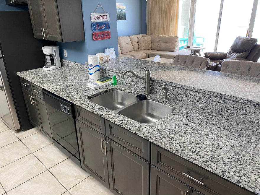 This is one of the best floor plans in Panama City Beach ! Long Beach Towers 2-304 is a LOW FLOOR condo with TWO beach front master bedrooms. This condo was totally remodeled with New Kitchen, Appliances, Furniture and much more.  This is one of the best floor plans on the beach, spacious kitchen/living area and large windows with incredible views! This condo is a wonderful rental investment with over $50,000 in income in 2019. Guests love the views and convenience of the low floor being able to avoid any elevators. Long Beach Towers is a gated complex with some of the best amenities on the beach such as 3 pools (one with a waterfall), hot tubs, poolside bar and grill. Come take a look at this condo and enjoy the best the beach.