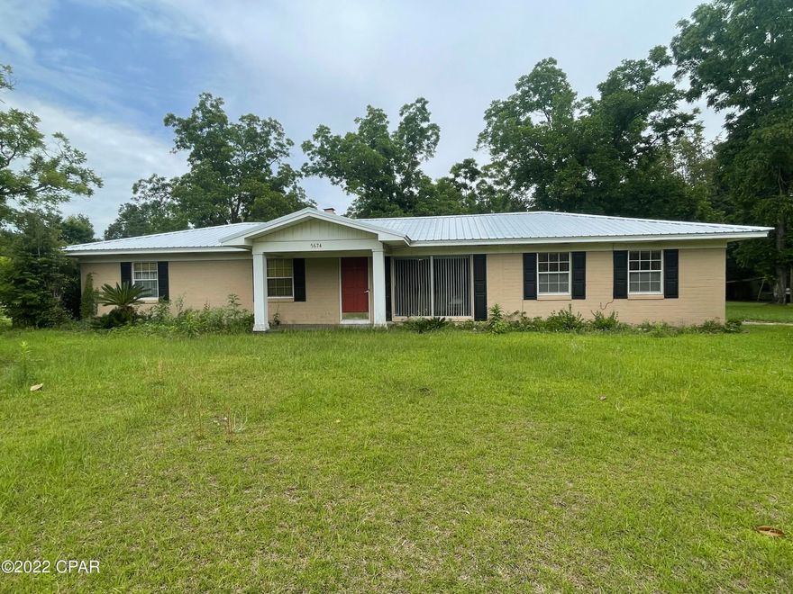 3 bedroom, 2 bathroom brick home with large yard and plenty of living space. This home is situated on a lot that is just under 1 acre. The home features an open kitchen with multiple living areas including a sun room that could be used as a dining room. The master has an en suite bathroom with shower. The other bathroom is easily accessed by the other two bedrooms and is tiled with shower/tub combo. Behind the home there is an additional yard building that could be used for storage or as a workshop.