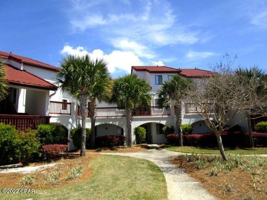 LAGOON-FRONT CONDO WITH ACCESS TO THE GULF OF MEXICO FROM THE COMMUNITY BOAT DOCK!  This unit is on the second level of a three-story building. 

This two-story unit boasts a full kitchen overlooking the Living Room with high ceilings that extend to the second-floor Loft/Bedroom.  The first floor has a Master bedroom with a full bath, and the Loft area on the second floor is perfect as an option for the Master or a second bedroom with its own full bath and large walk-in closet.  This beautifully-maintained complex is within a short walk of the sandy beaches and features a community center, in-ground pool, fire pit, shuffleboard and a full tennis court.  This is the perfect place for full-time living or enjoy it as a rental when not in residence.   Unit being sold in its AS IS condition.