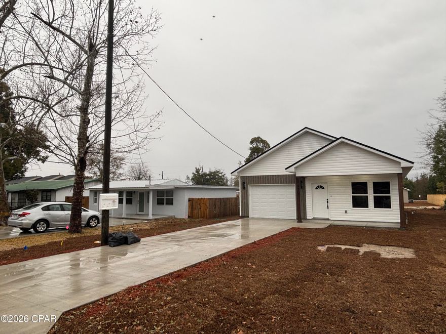 Welcome to this stunning brand-new construction home offering the perfect blend of modern design, comfort, and energy efficiency. This beautifully crafted residence features 3 spacious bedrooms and 2 full bathrooms, thoughtfully designed with an open-concept layout that maximizes space, natural light, and functionality.

The primary suite is a true retreat, complete with a generous walk-in closet and a luxurious en-suite bathroom featuring an elegant fully tiled shower, modern fixtures, and high-quality finishes. The secondary bathroom also boasts a tile shower, providing a sleek and cohesive contemporary look throughout the home.

Step inside to discover stylish and durable Luxury Vinyl Plank (LVP) flooring throughout the main living areas, offering both elegance and low-maintenance living. The heart of the home is the modern kitchen, equipped with quartz countertops, custom cabinetry, and ample counter space—perfect for cooking, entertaining, and everyday living.

This home was built with comfort and efficiency in mind, featuring spray foam insulation that provides superior soundproofing and energy savings, helping maintain a consistent indoor temperature while reducing utility costs.

Every detail has been carefully selected to create a move-in ready home with a clean, modern aesthetic. Whether you're a first-time buyer, a growing family, or an investor, this new construction offers exceptional value, quality craftsmanship, and contemporary finishes that truly stand out.

Don't miss the opportunity to own a brand-new home with premium features and modern upgrades—schedule your private showing today and experience the perfect combination of style, comfort, and efficiency.