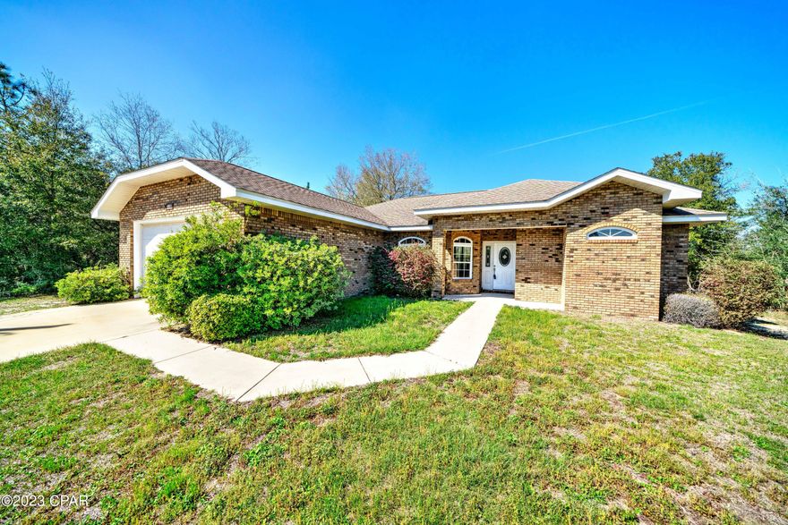 Priced to SELL!! 3230 Elkcam Blvd, located in Sunny Hills, brick home with 2 car garage, large front and back yards, quiet and peaceful living! Located 30 mins from Lynn Haven, 20 mins from Chipley, less than an hour from Dothan, Al. 3 beds, 2 baths, new interior paint. The kitchen, dining and family room are open with a split bedroom plan. Master Suite has sliding glass doors that go to the covered back porch as well as a master bath with double vanities. Sunny Hill also features a public golf course and golf cart friendly community! Come visit today!