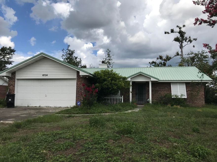 Selling AS IS WHERE IS.  This 3 bed 2 bath all brick home on a 1/2 acre sustained minor hurricane damage.  Due to going through Probate it has been vacant since April 2017.  There is some damage to the garage door, a few pieces of drywall need to be replaced in the garage and the home has mildew (no mold seen) in it due to the electric being off for so long.  The yard is in need of some TLC.  The power will not be turned on for inspections.  The seller has never lived in the home (it was his parents) so he cannot make any determination as to any of the appliances, HVAC, Water Heater, Well, Water Softener or Septic but to his knowledge everything was working at the time his mother lived in the home. It  includes a large like new shed and a smaller shed in the chain link fenced back yard. The home is split floor plan & tiled throughout.There is a fireplace, galley kitchen, and large Florida Room.  There is also a covered patio.  This would make a great home or investment property.  It's just down the road from Bayhead North Public Boat Ramp and Kayak Launch to access Deerpoint Lake.  Come see this great opportunity today!