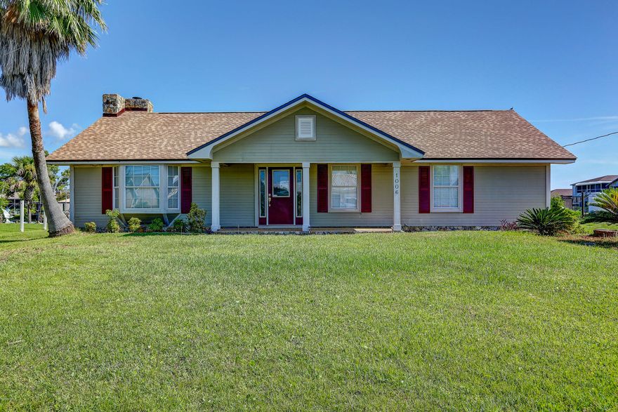 CURRENTLY UNDER CONTRACT. 

 SELLER ACCEPTING BACKUP OFFERS. 

 Waterfront with access to bay!  This well maintained ranch style home is located on a cul de sac.  It is an open floor plan with a large family room with vaulted ceilings.  It also includes a cozy wood burning fireplace.  The kitchen has white solid wood cabinets making it light and bright.  The large master bedroom includes a sitting area.  Master bathroom has both a soaking garden tub as well as a separate shower/tub, large walk in closet, and 2 separate sinks.  

Outside there is a spacious deck with plenty of room for outdoor entertaining.  Walk out to a nice dock to catch some fish or launch your boat from the boat launch on site.  New roof recently completed.  Come see this affordable deep water canal front home!