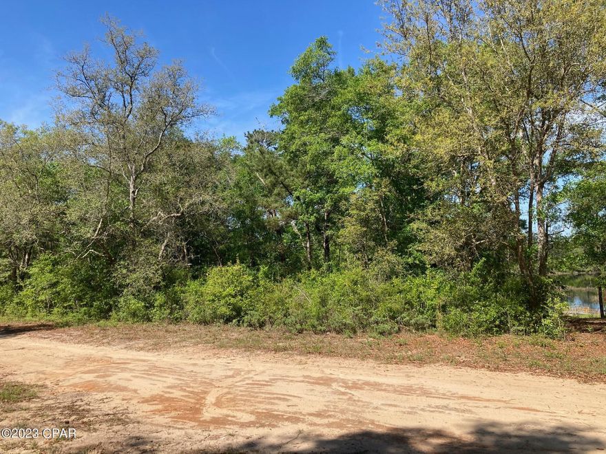 Lakefront living in the gated Paradise Lakes subdivision can be your reality! These two side by side waterfront lots are waiting for your dream home to be built. Approximately 1.58 acres total.