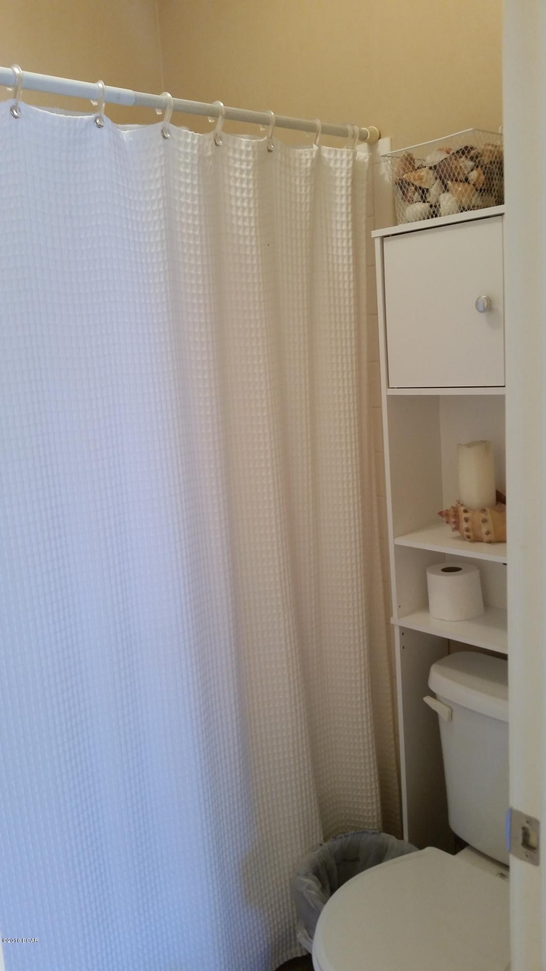 Quarter Deck Condo. - Residential Lease