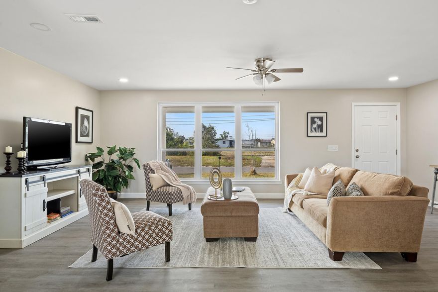 This charming home is ready for your family! The 3 bedroom, 2 bath home is centrally located close to Tyndall AFB, schools and shopping.  It is beautifully updated with Luxury vinyl plank flooring, new kitchen cabinets with quartz countertops, and new appliances. The hall bath has a new tub/shower unit and vanity.  The master bath has  a beautifully tiled walk in shower and the master bedroom has a large walk in closet.  The interior has been  freshly painted throughout and the exterior  painted as well. There is a new roof , a new HVAC system and hot water heater. The home features a beautiful large living room and dining area. There is also a large laundry room and  two car carport.  A large patio is located in the back just outside of the kitchen for easy entertaining or just relaxing. Your family will enjoy the spacious back yard as well.  There is a well on the property, which is a wonderful option to be used for a sprinkler system for the lawn. The pump has been removed, therefore the Buyer would be responsible to  have the well inspected and new pump installed if desired.  
All measurements are approximate.  Buyer to verify if important.  
Call your favorite Realtor today to see this wonderful home!