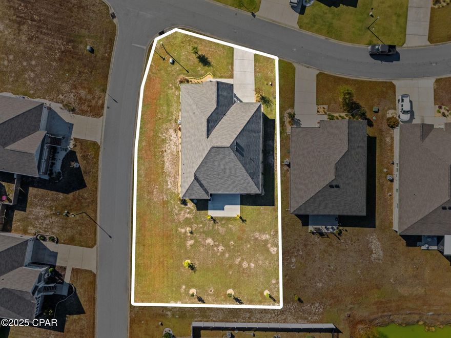 $5,000 in Seller concessions with accepted offer!!!

Welcome to a home designed for living life to the fullest. This 5-bedroom, 3-bath beauty sits on a spacious corner lot in one of Panama City's most welcoming, golf-cart-friendly communities. With over 3,100 sq. ft. of space, it's the kind of home where gatherings feel effortless, mornings feel peaceful, and the water views are endless without the price tag

The heart of the home a beautiful kitchen—complete with stainless steel appliances, modern cabinetry, and a generous island that naturally becomes the gathering spot for everything from weeknight dinners to game-day spreads. The open layout flows into the living and dining areas, making hosting friends and family a breeze.

Relax in the owner's suite, your private retreat with a spa-like ensuite bath and direct access to the patio—perfect for stepping outside with your morning coffee. A flexible bonus room offers space for a home office, playroom, craft room, or quiet study zone.

Outside, a large backyard gives kids and pets room to play while you enjoy grilling out or unwinding under the stars. The community brings even more to love, with a resort-style pool, pavilion, walking spaces, and friendly neighbors who make it feel like home the moment you arrive.

Close to the airport, shopping, restaurants, and the sugar-white beaches of the Emerald Coast, this home offers the best of everyday convenience and coastal living. Come experience it for yourself!

Buyer to verify all information and measurements.