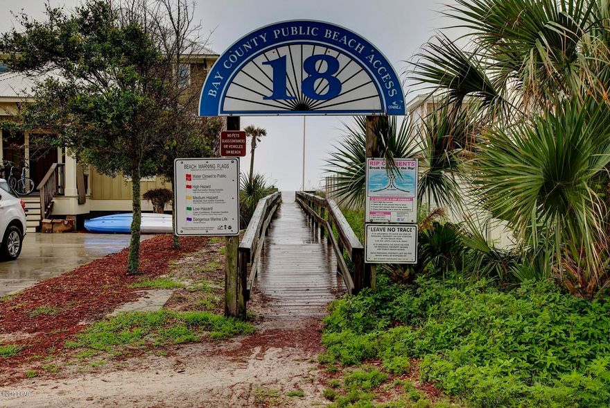 Spacious town home designed for comfortable living just steps from the sandy white beaches of the Gulf of Mexico.  Beach Access #18 is across the street and gives easy access for swimming, sunbathing or a sunset walk.  This home has been a primary residence which offers architectural interest and comfortable living.  As a vacation home, the location places you centrally on the beach on a side street of homes.