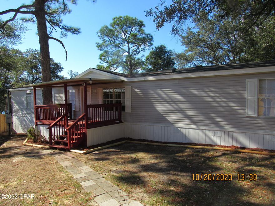 Beautiful Lakefront Property in North Bay County Florida. Pool on back deck. Heavenly sunsets. Some of the best fishing on the planet right from your own backyard and the best thing about it is the home has been completely remodeled. This home is all about the good life.  You will utilize the decks and porches for early morning devotions or for entertaining in the evenings. Sit in one of your two living rooms and take in the view of the lake. If you are real quiet, you can watch the deer as they come for a drink on the lake shore at dusk. You might even see an eagle catch a fish every now and then. The setting here is peaceful and you can paddle board or kayak right off your own beachfront. Location is also great because this home is only minutes away from the World's Most Beautiful Beaches Panama City Beach and Famous Pier Park Shopping. There is so much to do here in Northwest Florida with Tyndall Air Force Base being less than 40 min away and lets not forget about Econfina Springs where you can swim, dive, snorkel, canoe or hunt for artifacts. Just down the road are The Marianna Caverns and many State Parks and Natural Florida Hiking Trails. There are so many more reasons to come and see this newly remodeled home for yourself. Make the call today for your private showing.