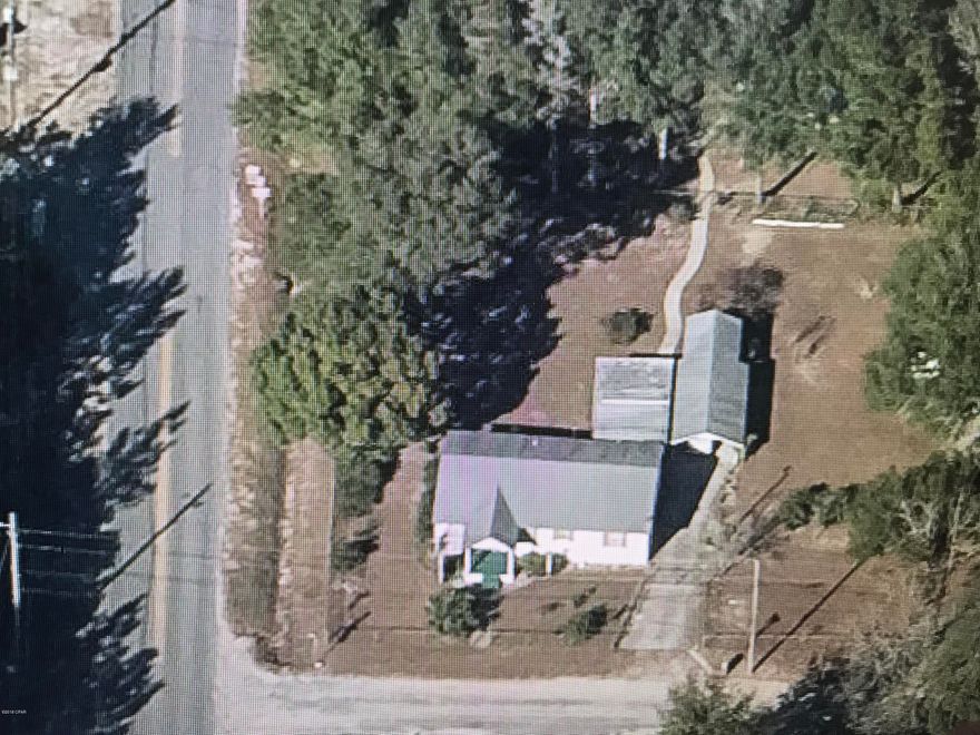 Location!!  1/2 mile to North Bayhaven School and 5 minutes to the mall....3 bedroom home new paint and window blinds through out, newer hot water heater, new flooring, new pump and well, level ot with mature trees, fully fenced with pens for pets, 22 x 14 carport, 24 x 14  covered patio,14 x 10 storage shed,  comes with all appliances including washer and dryer, Move in ready!! Easy to see...vacant and ready to show.