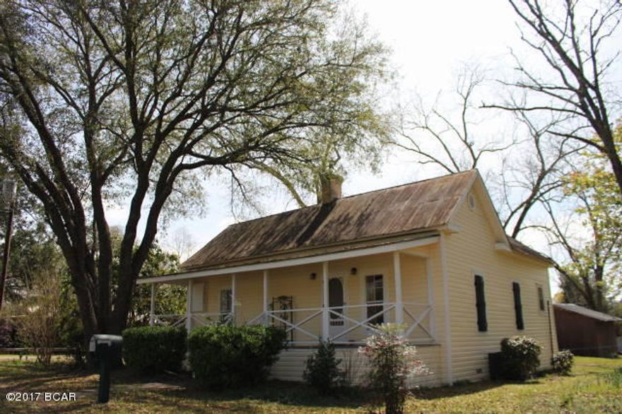Move in Condition 1900's home with 10 ft ceilings located in the heart of Alford. Updated electrical. New HVAC in 2009. 2005 one bedroom - one bath addition. Blown attic insulation, insulation board when added vinyl siding along with new sub flooring & floor joists in 2004. Inside laundry room. Landscaped with plenty of pecan trees, pear & kumquat and beautiful flowering crept myrtles.  Plenty of garden space. Workshop. Located on an oversized corner lot. Home is furnished.