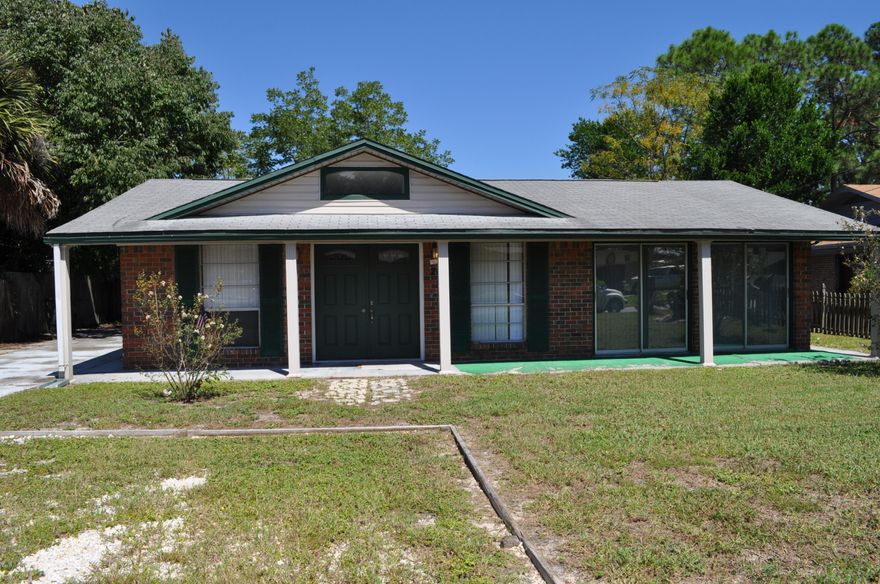 Just two blocks from the Gulf of Mexico is where you'll find this home! Nestled within the quiet Open Sands subdivision, this is an all-brick home with 3 bedrooms and 2 baths.  Most of the home has tiled floors which is attractive and easy to maintain.  Nice big patio in the backyard along with a 16x24 insulated shed/workshop and a one car garage with overhead storage.  This is an excellent first-time buyers home or a weekend getaway. Not only are you walking distance to the beach, you're only five minutes from Pier Park and Frank Brown Recreational Complex.  All info is approx and must be verified by Buyers if important.