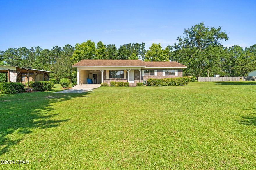 Welcome to your serene country retreat! Located in the highly sought-after Duncan Community Rd. area, this charming ranch-style brick home offers the perfect blend of peaceful living and convenient proximity to town. With a newly paved road leading to your doorstep, you can enjoy easy access to local amenities while relishing the tranquility of rural life.

This 3 bedrom 1.5 bath home features a comfortable layout and an attached single-car carport for everyday parking needs. Additionally, there is a detached covered parking area, perfect for extra vehicles, boats, or recreational equipment. From the living room window, you can enjoy picturesque views of the serene pond across the street. The expansive lot offers ample space for adding fencing, accommodating farm animals, or creating your dream garden. The property includes a versatile workshop and an additional storage building, ideal for DIY projects, hobbies, or extra storage space. Plus, the home comes partially furnished, making your transition smoother.

Experience the best of both worlds - the peace and quiet of country living with the benefits of modern conveniences nearby. Whether you're looking to start a small farm, enjoy a serene country lifestyle, or simply find a peaceful retreat close to town, this property has the potential to meet all your needs. Don't miss out on this unique opportunity to own a piece of paradise in the Duncan Community. Schedule a viewing today and imagine the possibilities!