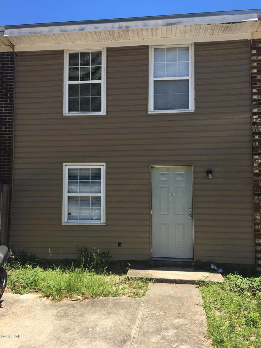 Lovely little Townhouse, great for investors, first time buyers, or even college student. 5 minutes drive to Gulf Coast State college and FSU PC and 10 minutes from beach. Great rental property Brings in over $800 a month. 3 bed room 1.5 bathrooms. More pictures to come.