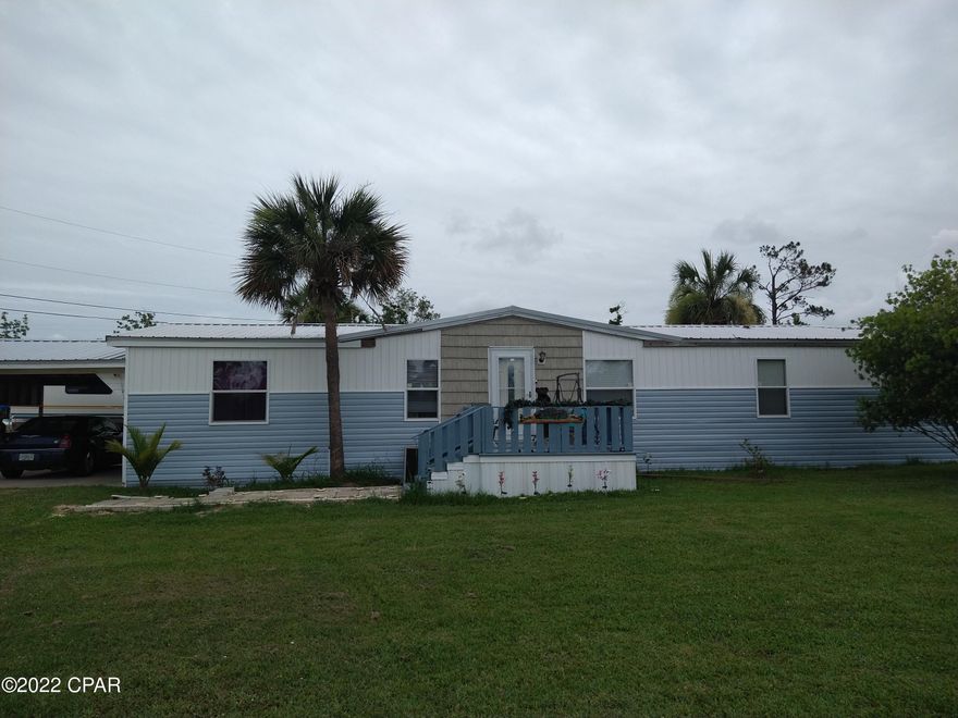 This is a 1.742-acre lot with a 3 bedroom, 2 bath mobile home. The property has a 24 x 12 inground salt water heated pool, pool house, extra-large garage used by owners in the past to repair semi' trucks. Plenty of room to store any large recreational vehicles, boats etc. So many possibilities!