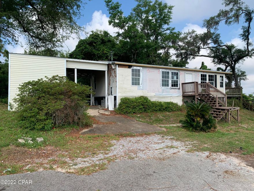 WATERFRONT! Calling all investors! Damaged manufactured home sitting on .175 Acres with 51' of Water Frontage on Lake Martin. 



Included in this purchase are two separate, non Water Front, adjoining lots. 408 Magnolia: PID-25539-010-000. .142 Acres. 410 Magnolia: PID-25539-000-000. .142 Acres.