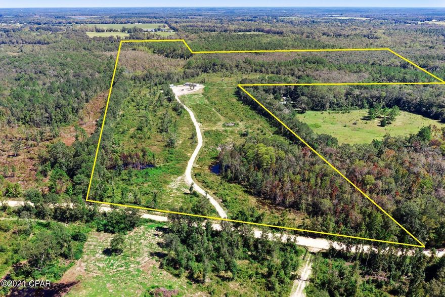 Secluded in northern Holmes County and nestled atop of more than 88 acres sits this gorgeous 5 bedroom, 3 bath mobile home. Inside features include a spacious living room, open dining/kitchen with island, 4 spare bedrooms, 2 of which have a jack-n-jill bath, additional full guest bath and a master suite with walk-in closet. Enjoy time outside farming, hunting or riding ATV's. Property is located just minutes from Hwy 79 and a short drive across the Alabama line.