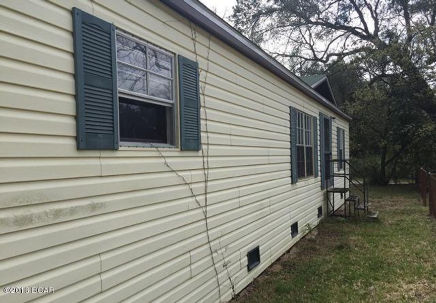 Property consists of a large double wide manufactured home connected to a guest house. This home is surrounded by fence on a corner lot. This spacious home has an enormous living room, generous kitchen, plenty of shade and a large covered back porch. There is a sizable shed for extra storage and plenty of yard space for pets.