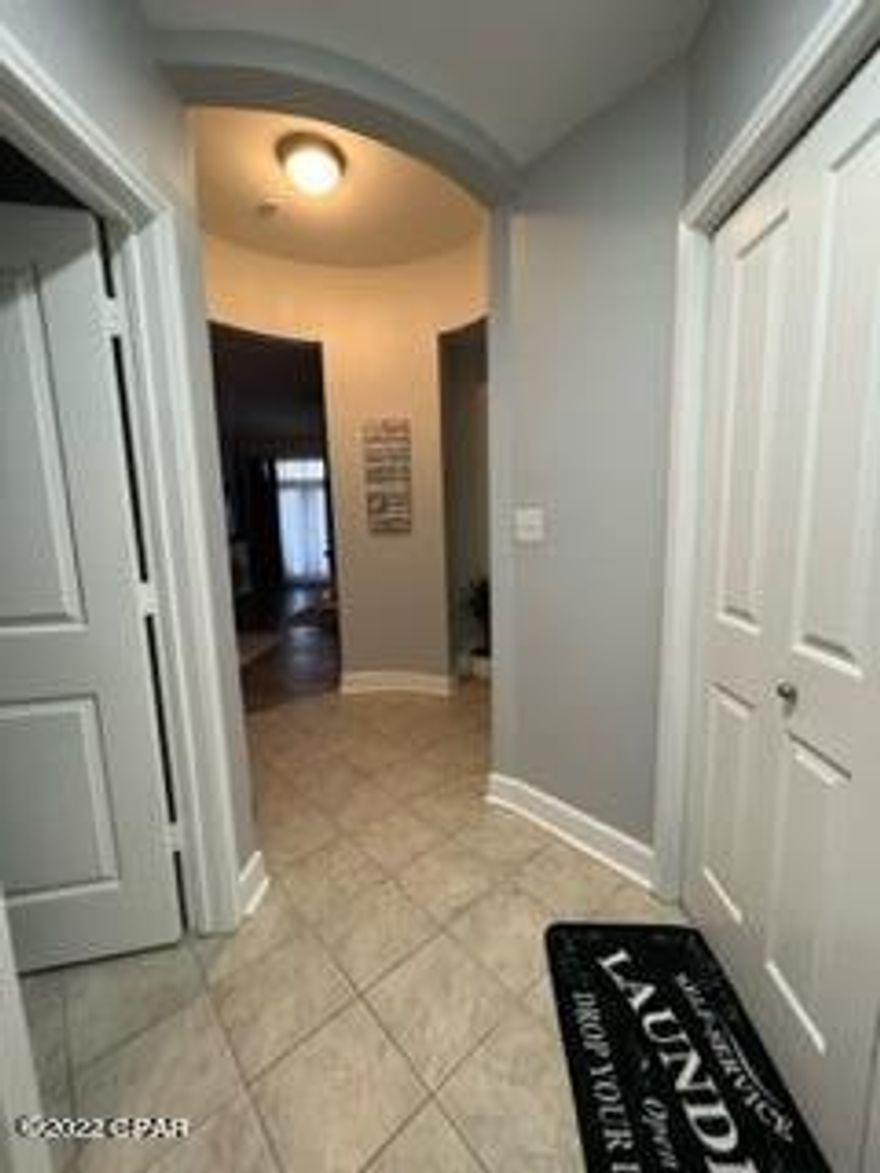 FULLY FURNISHED AND MOVE IN READY.  All furniture and furnishings new in 2022. Enjoy resort living at its best in beautiful Island Reserve.  This complex boasts of many amenities including a one-acre lagoon style pool with waterfalls, fitness center, basketball/pickleball court, splash pad and community room.  This unit has a spacious open floor plan with two bedroom suites on each side, 10 ft. ceilings, crown molding, granite countertops and stainless steel appliances. This gated community has a covered garage with direct access to your floor as well as an elevator in each building for easy access to the pool.  Other added improvements include new hot water heater, AC is four years old, recently painted, luxury vinyl plank floors in living/dining room, immaculate and move in ready. Convenient to shopping, entertainment, fishing and approximately 1.4 miles to our beautiful white beach. Escrow Agent is Mason Title, 11501 Hutchison Blvd., PCB, FL 32407, Kathy Prumatico, 850-236-9090, kprumatico@masontitle.com