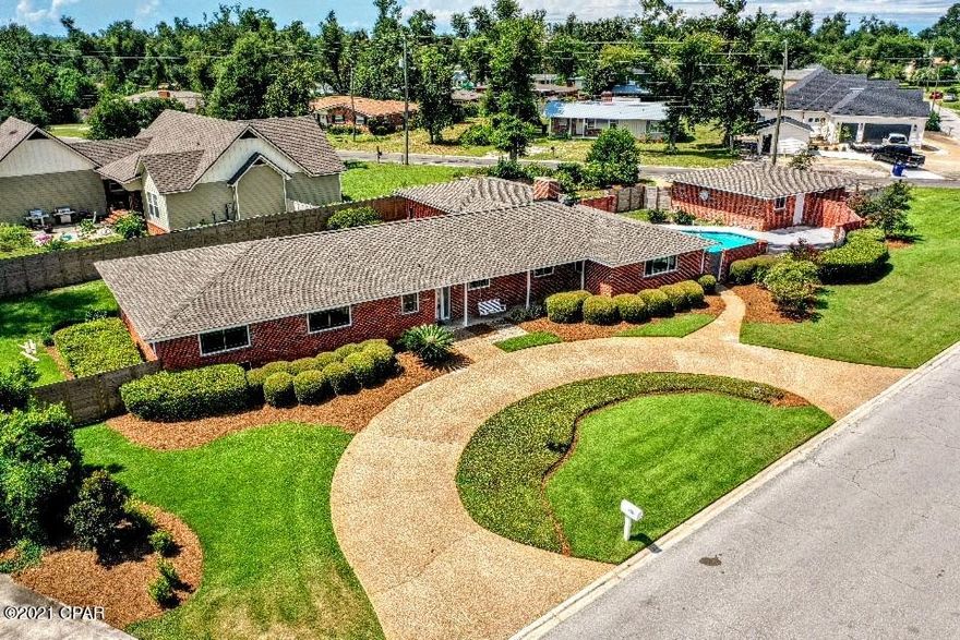 1320 Bayou Ct, 4 beds, 3 baths, over 2900 sq ft, 4 car garage, in-ground pool, all brick and plenty of parking with two driveways. The interior has just been painted, upgrades include new windows, new sliders, new floors, new stainless appliances, quartz counters and large butcher block / eat at bar. The kitchen is open to the family room leading to a multi-purpose / home school / play room as well as a formal dining room. The home has plenty of storage and checks a lot of boxes for the Cove! Golf cart friendly, close to St Andrew Yacht Club, Come visit today!