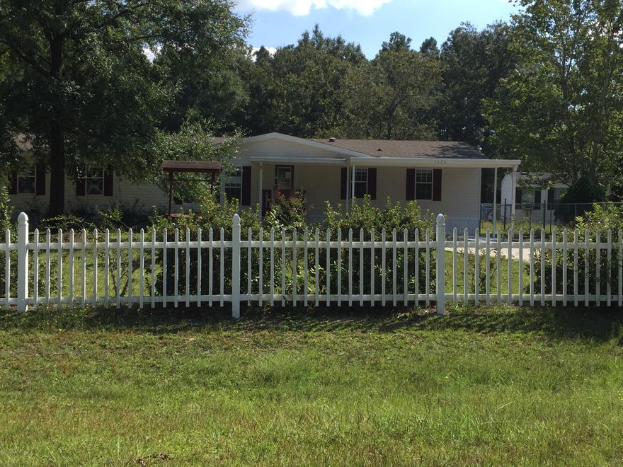 Here's a great opportunity to own a manufactured home, in the Hwy 231/Star Ave area, with over 2100 SF, LARGE rooms, Awesome Kitchen, fireplace, storage building and HUGE closets.  The home is a Horton 2003 model and sits on  a 1/2 acre lot.  This is a great location for those who wish to be convenient to TAFB or anywhere downtown or 23rd St.   The road is paved and close to convenience stores and restaurant chains.