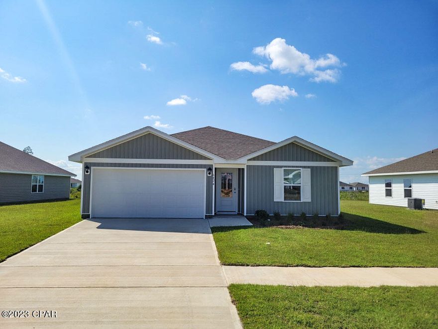 Liberty neighborhood is conveniently located in beautiful Panama City off Star Avenue near 231. Located just 25 minutes from Tyndall Airforce Base, 20 minutes to hospitals, and less than 15 minutes to shopping, restaurants, and grocery stores you will be amazed at the convenience once you enter the winding entrance to this beautiful sanctuary. Liberty, D.R. Horton's premier new lifestyle community, offers a 7,500 square foot community center with full gym, wellness rooms and much more. Additionally, behind the community center is a water wonderland with resort style pool, splash pads, and an outdoor grilling kitchen with seating. Just when you thought it could not offer more, there are sidewalks, ponds, fountains, and conservation areas throughout this beautiful neighborhood full of nature.
When you enter the Freeport floorplan through the prairie door you will notice immediately the brightness of the entry hallway. This 4-bedroom 2 bath, 1387 square foot, home is an open floorplan with two bedrooms separated by a full bathroom at the front of the home and one bedroom across the entry hallway affording family and friends alike privacy when visiting. The large kitchen island overlooks the dining room and living room allowing all to be together or doing individual tasks in each area. The main areas of the home as well as the bathrooms and laundry have beautiful luxury vinyl plank while the bedrooms offer plush carpeting. The spacious primary bedroom leads to the bathroom featuring a large shower, single vanity, and a large closet. This home is situated on beautiful lot, entering the cul de sac and backing to the conservation area. This 4-sided vinyl home comes with the front, sides, and backyard sodded. This 4 sides vinyl home is situated on a large lot, sodded on 4 sides, located amidst beautiful trees, ponds, and fountains.