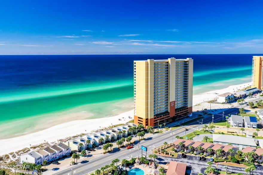 UNDER CONTRACT-TAKING BACKUPS Exceptional Rental Income! 4 Bedroom, 4 Bath, West end, 6th floor condo with 2 Gulf front Master suites!  Located at the sought after West end of Front Beach Rd approximately 5 miles from 30A, this rare gem is one of only 3 four bedroom plans in the Building!. It features a highly efficient floor-plan with two Gulf facing Master suites on opposite ends of the great room with access to the 10' x 43' covered balcony. Seamless transitions from the open concept kitchen with long breakfast bar to the large dining and living area allowing plenty of gulf views and room for entertaining friends and family. It is turn-key and well appointed  with light, coastal colors, tile plank floors thru +out, stainless kitchen appliances and granite counter tops. There is also a full  laundry room and reserved parking space in the secured garage below.
Topic Winds amenities include controlled access, security guard,  indoor/outdoor seasonally heated pool, large patio and grilling area,  whirlpool, steam room, sauna, workout and meeting room.
Feel worlds away while enjoying the conveniences of being  just minutes to great restaurants, Pier Park with shopping, nightlife, and Hwy 30A.