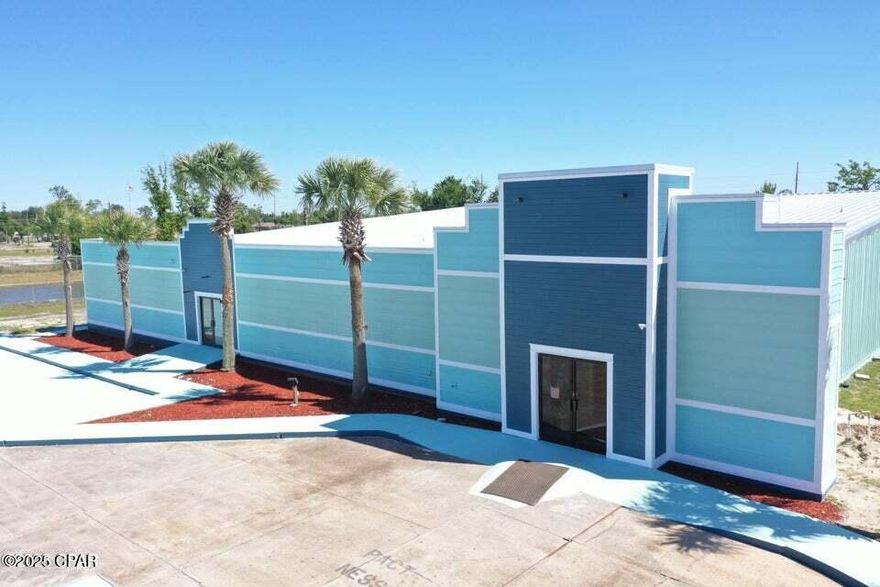 $12 per sqft NNN. This property is a prime commercial opportunity located in Panama City, FL, offering 21,184 sq ft of under roof space on a 2.5-acre lot. Zoned for mixed use, this property presents an opportunity for a variety of businesses. Fully renovated post-hurricane, it has a new 24-gauge standing seam metal roof and is constructed using red iron clear span beams. This construction allows for interior changes to be easily accomplished. Inside, you will find multiple reception areas, executive offices, and a kitchenette. The open footprint of the building allows for a wide range of uses for a multitude of businesses. A separate entrance on the left side allows for potential subletting. Parking lot accommodates 4 spaces per 1000 sq ft with room to expand. All utilities are easily accessible, and open roof access allows for modifications. This space has 2 separate areas that each have their own entrance. The main area is 18,385 Sq Feet, and the smaller area is 2,799 Sq Feet. The owner is open to leasing the entire space, or leasing the spaces separately.