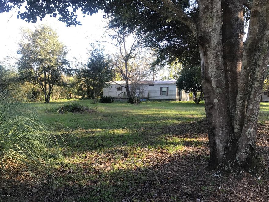 11.66 acres on the corner of Gardenview Road and Fairview Road!  Frontage on two paved roads!  Open pasture has nice rolling terrain.  Large metal barn.  There is a 1984 double wide mobile home on the property that needs some work.  Call today to schedule an appointment to see this property!