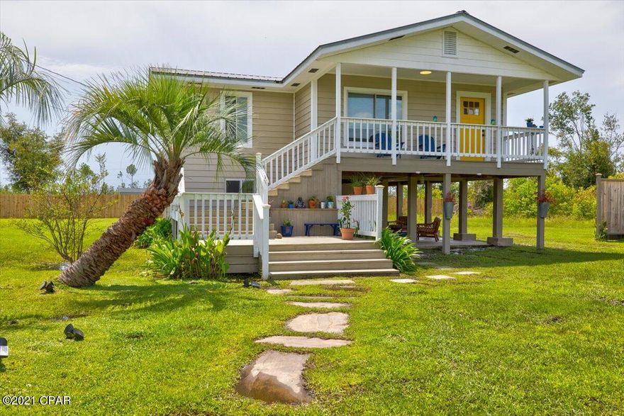 *NEW ROOF & AC *USDA 100% financing eligible. This Fully renovated home sits on 1.7 acres and features a small apartment, pole barn and shop. You will enjoy quiet country living with still being close to town. When you enter the home you will notice the spacious Livingroom, fresh paint, new 3/4'' distressed oak flooring and the updated kitchen. The kitchen opens to the Livingroom and features gorgeous wood cabinets with under cabinet lighting, stainless steel appliances with a double convection oven, quartz countertops, a tile backsplash, sink w/drying rack/cutting board and a built in custom desk or coffee bar. As you continue through the home you will find the master bedroom with a walk in closet and fully updated bathroom to include a new tile shower and a new vanity. There are two..... additional spare bedrooms in the main house and an updated spare bathroom. The bathroom features a new floating vanity with a tile accent wall and a tile walk-in shower. As you head downstairs you will notice the large front deck that would be perfect for your morning cup of coffee. The small apartment is located on the first floor and would make a great space for an teenager, elder parent, guests or a separate space to rent out and bring in income. The apartment has tile flooring throughout, a bedroom, small kitchenette, sitting area and a full bathroom. The bathroom has been fully renovated and also showcases a tile walk-in shower and new floating vanity with a tile accent on the wall. When you step outside you will notice the huge covered patio that is perfect for entertaining and has bead board ceilings, led can lighting and an outdoor shower. There is also a large built in table with granite countertops. The laundry room is located in a separate room downstairs. All sizes, ages are approximate, please measure and/or verify if important.