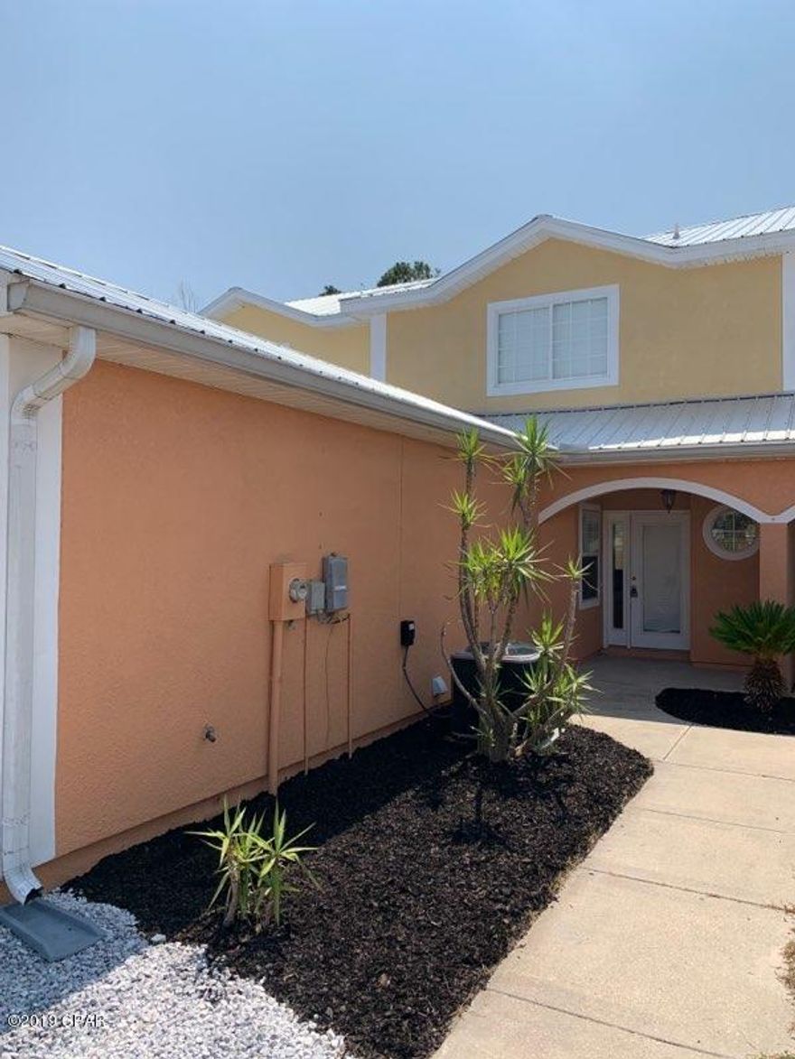 Newly updated, Townhome with garage and privacy fenced back yard. This home is nicely laid out. Large open Living area with lots of light and newer flooring. Spacious kitchen with lots of counter space and all appliances stay. Downstairs 1/2 bath convenient to guests. Incredible Master suite with large walk in closet and bath. Complete with large oval soaking tub, double vanities, and separate shower. Other bedrooms are spacious and down the hall from the master for privacy. This home has new (this year) metal roof and AC. So enjoy all the space without the yard work. Lots of storage in the garage