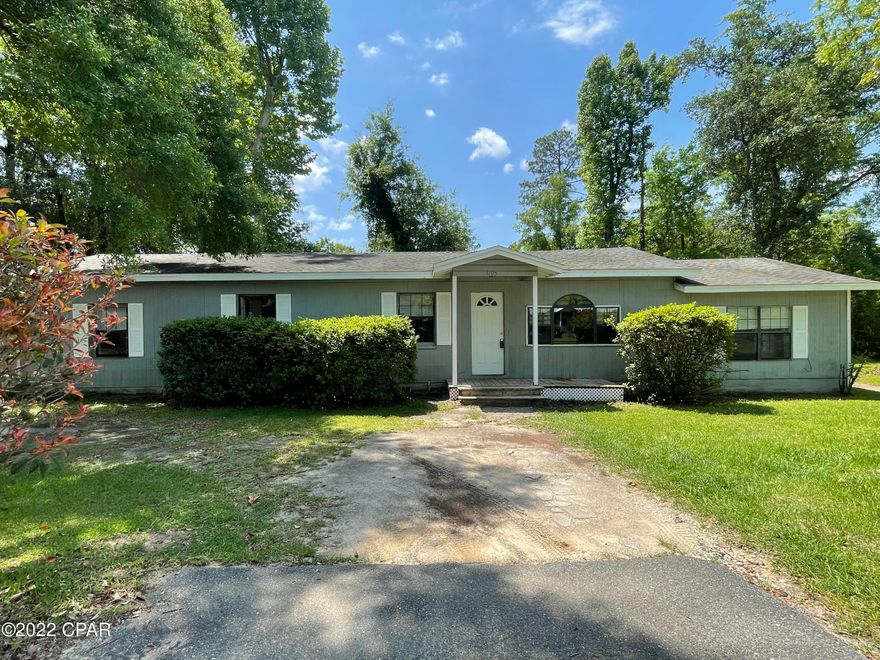 4 bedroom, 2 bathroom home on quiet street in Marianna. This home features an open floor plan with a spacious living room with built in shelves. There is one large bedroom with double closets on one end of the house and the additional two bedrooms are on the other end of the house. The master bedroom has an en suite bathroom and walk-in closet. The backyard is partially fenced in with a privacy fence perfect for a small dog. The wooded lot adjacent to the property conveys and would give you the option to have a large side yard or leave trees for privacy.