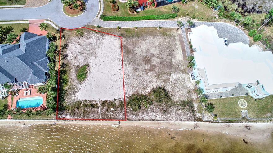 Welcome to Dolphin Bay. Enjoy dream views of St. Andrews Bay on this spacious bayfront lot. This gated subdivision is a family oriented, pet friendly community located only minutes away from the World's Most Beautiful Beaches as well as a private marina, tennis/pickleball/basketball court and picnic areas. The Harbourage Yacht Club is conveniently located in the community and offers 64 spacious boat slips with easy access to the bay and Gulf of Mexico. Buyer should verify measurements and information.