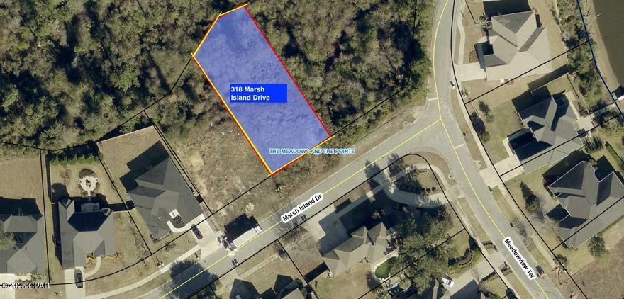 Vacant residential lot in the Meadows.   Lot is irregular and slopes to the creek.  The Meadows is an upscale neighbourhood. Neighborhood has a homeowners association.  Home  and floor plan must be approved by the HOA ARB.    Buyer to verify dimensions and dues.