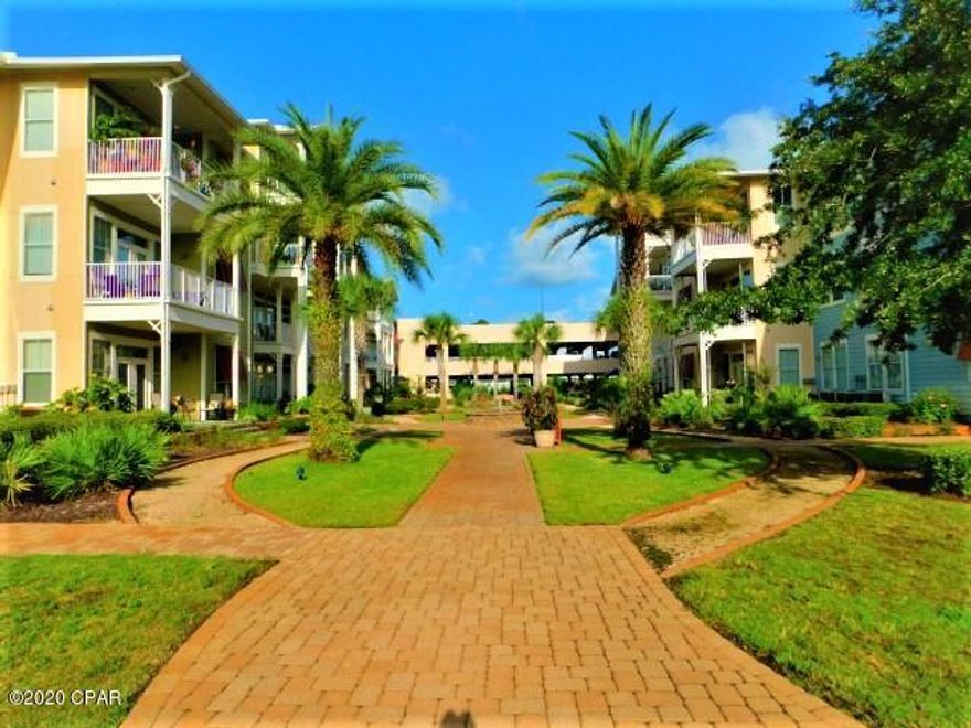 CURRENTLY UNDER CONTRACT.  SELLER ACCEPTING BACKUP OFFERS. Paradise awaits you as you go through the gates of this beautiful property.  Resort style living but no short term rentals.  Gated community with tons of amenities such as a 1 acre island style pool with waterfalls, hot tub, fitness center,  game room, theater room, basketball court & more! This condo offers two master suites, one with soaking tub & shower, the other with shower.  Both have walk-in closets.  Updated with plantation shutters, crown molding, new floors in bedrooms & nice paint colors. Flooring is bamboo and tile.  No carpet.  The kitchen has stainless steel kitchen appliances & granite counter tops. Washer & dryer stays with unit.  Awesome pool & courtyard view from balcony.